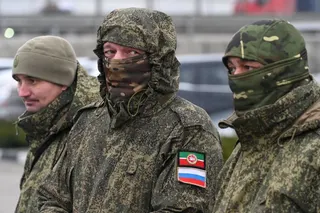Russian service members take part in a ceremonial handover of humanitarian aid provided by employees of the truckmaker Kamaz, mediated by the People's Front political movement and intended for Russia's army involved in the ongoing military conflict against Ukraine, in Rostov-on-Don, Russia, February 20, 2026. REUTERS/Sergey Pivovarov