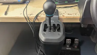 The Logitech RS H-Shifter set up at a desk.