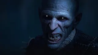 A scary image. A vampire with pale, almost grey wrinkled skin, and no facial or head hair, close up, snarling, sharp teeth bared. I'd run.
