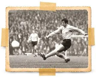 Black and white action shot of Ian Butler scoring Hull City's second penalty in the Hull City v Manchester United Watney Cup match in 1970