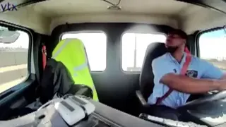 A man is seen driving a truck.