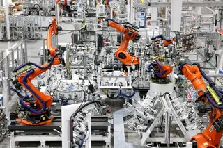 Robots produce automotive body parts at a mold stamping company in Fuzhou, Fujian province, April 16, 2026. Photo: Costfoto/NurPhoto via Getty Images