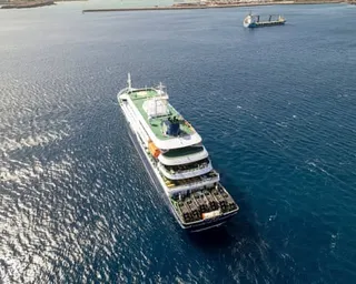 Vessel in glistening ocean