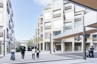 People crossing a street in a modern city