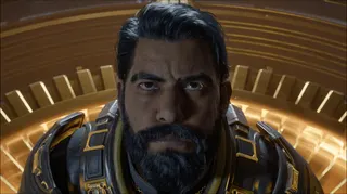 A screenshot of Saros, showing the protagonist Arjun, looking toward the ceiling. His head and shoulders are visibile from a top-down, face-on perspective.