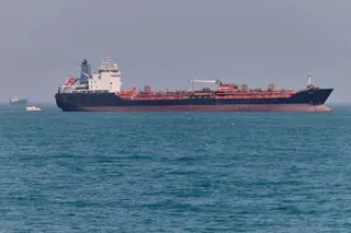 An oil tanker sits at anchor in the strait of Hormuz off Bandar Abbas, Iran, on 2 May 2026.