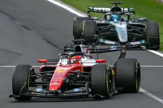 Ferrari's Monegasque driver Charles Leclerc (L) and Mercedes' British driver George Russell drive during the Formula One Australian Grand Prix at the Albert Park Circuit in Melbourne on March 8, 2026. (Photo by Paul Crock / AFP) / -- IMAGE RESTRICTED TO EDITORIAL USE - STRICTLY NO COMMERCIAL USE --
