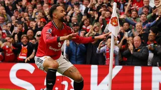 Manchester United forward Matheus Cunha does his surfing celebration after scoring at Old Trafford