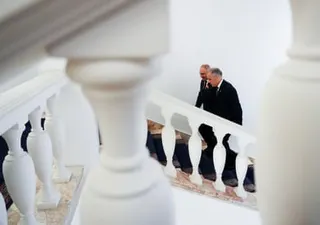 Mark Carney ascending a staircase with Nikol Pashinyan