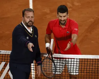 Novak Djokovic argues with a referee at the French Open