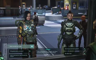 Two women in armoured spacesuits standing side by side with dialogue menus arranged along the bottom of the view, in a scene from The Expanse: Osiris Reborn.