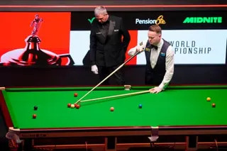 England's Shaun Murphy plays a shot during his match against China's Wu Yize.