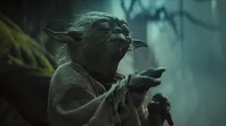 Yoda uses the Force to lift Luke’s X-Wing in a still from Star Wars: The Empire Strikes Back
