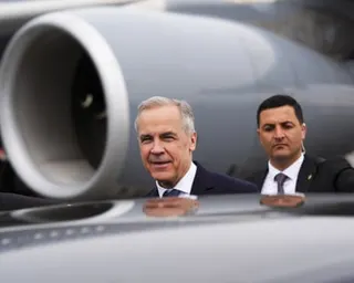 Mark Carney getting into a car on an airfield