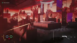 007: First Light screenshot from gameplay showing gun combat in the 'red room' of a museum, where statues are silhoetted against red LED patterns on every surface. Bond hops over a ledge.