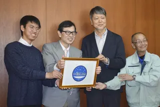 Astrophysical expert Shinya Narusawa (second from left) and others at the launch of the Japanese Society for SETI in Kobe, Hyogo prefecture, last month. Photo: Kyodo