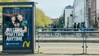 BBC An advert for McDonald's on a bridge in the centre of Amsterdam