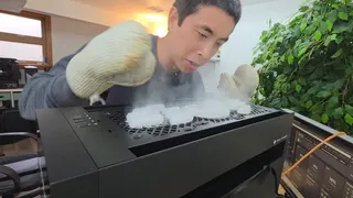 A YouTuber putting dry ice on top of a gaming PC