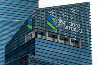 The Standard Chartered logo on Tower 1 of the Marina Bay Financial Centre in Singapore. Photo: Harvey Kong