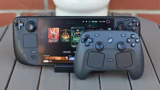 A Steam Deck and a Steam Controller on a table.