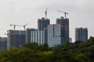 Residential and commercial buildings under construction in Shenzhen, Guangdong province, March 22, 2026. Photo: Getty Images