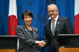 Anthony Albanese shakes hands with Japan's prime minister, Sanae Takaichi.