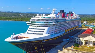 Disney Fantasy cruise ship docked at port in Falmouth Jamaica
