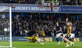 Mohamed Belloumi finds the net with a curling effort.