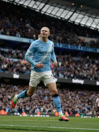 Manchester City's Erling Haaland celebrates after scoring his side's opening goal during the English Premier League soccer match between Manchester City and Brentford in Manchester, Saturday, May 9, 2026. (AP Photo/Dave Thompson)