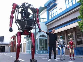 Image may contain Robot Person Teen Clothing Glove Footwear Shoe City Accessories and Glasses