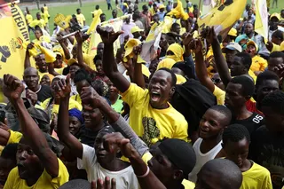 Supporters of President Yoweri Museveni celebrate after the announcement of the winner of the elections in Kampala in January. Photo: EPA
