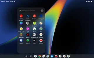 Desktop window of search field with suggestive text “Search apps from your phone”, and grid of mobile apps.