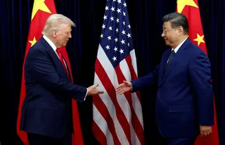 US President Donald Trump shakes hands with Chinese President Xi Jinping as they hold a bilateral meeting at Gimhae International Airport, on the sidelines of the Asia-Pacific Economic Cooperation (Apec) summit, in Busan, South Korea October 30, 2025. — Reuters pic