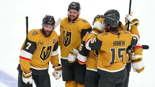 Alex Pietrangelo celebrating a goal with teammates on ice at T-Mobile Arena