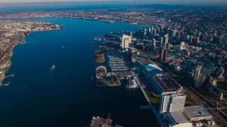 Aerial view of San Diego skyline and harbor on ocean bay in California