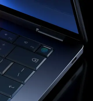 Close-up of key on laptop keyboard with impression of a fingerprint.