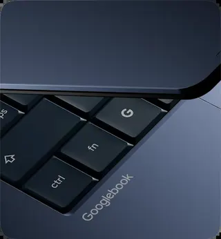 Close-up of key on laptop keyboard with Google ‘G’ logo.