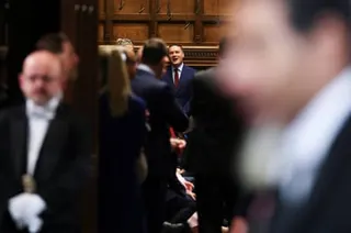 Wes Streeting speaking with colleagues in the Commons before the king's speech.