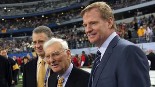 Pittsburgh Steelers owners Art Rooney II and Dan Rooney standing with NFL Commissioner Roger Goodell