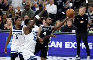 SAN ANTONIO, TX -MAY 12: De'Aaron Fox drives past Julius Randle #30 of the Minnesota Timberwolves in the first half of Game Five of the Western Conference Semifinals NBA Playoffs at Frost Bank Center on May 12, 2026 in San Antonio, Texas. NOTE TO USER: User expressly acknowledges and agrees that, by downloading and or using this photograph, User is consenting to terms and conditions of the Getty Images License Agreement. Ronald Cortes/Getty Images/AFP (Photo by Ronald Cortes / GETTY IMAGES NORTH