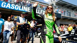 Danica Patrick driving an IndyCar race car on a track