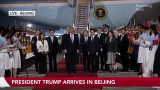 Trump Arrives in China For High-Stakes Meeting With Xi