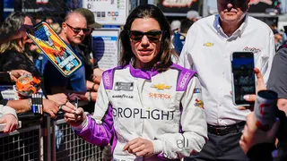 Driver Katherine Legge signing autographs at Phoenix Raceway