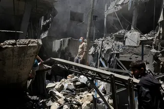 Palestinians inspect the site of a Friday Israeli air strike on houses, at Shati (Beach) refugee camp in Gaza City, May 9, 2026. — Reuters pic