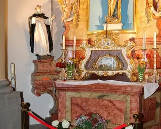 A broken display case in a church