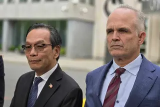 Lu Jianwang (left) and defence lawyer John Carman outside federal court in Brooklyn, New York, on Wednesday moments after the verdict was read. Photo: SCMP