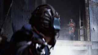 A raider in Arc Raiders looking back at another raider no a ledge, aiming their gun at them.
