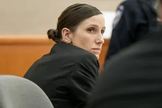 a woman turns and looks to her side