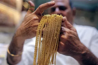 Gold necklaces at a Umedmal Tilokchand (U.T) Zaveri jewelry store at Zaveri Bazaar in Mumbai, India.