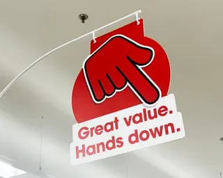 A big red hand signage at a Coles supermarket